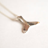 Silver whale tail necklace