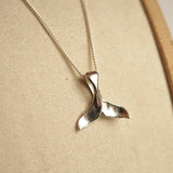 Whale tail pendant