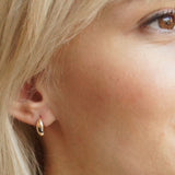 tiny gold huggie earrings 10k yellow