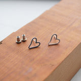 Silver hearts stud earrings