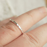 hammered silver ring on old ladies finger