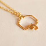 Gold Honeybee in hexagon