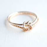 gold and silver knot ring mixed metal