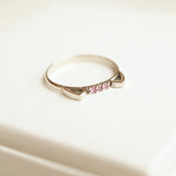 3 tiny pink sapphires in cat ring