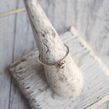 Gold stacking ring with gemstone dangle