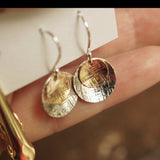 Gold and silver disc earrings