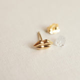 Earrings shaped like lips