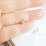 Tiny gold lips earrings