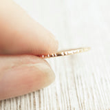 thin simple gold wedding band hammered finish