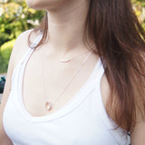 circle slider pendant on model Alex