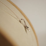 Whale tail necklace