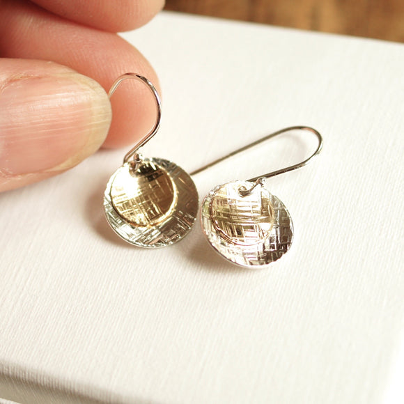 gold and silver dangle disc earrings